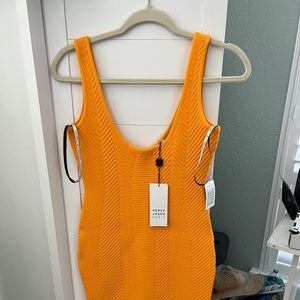 Orange Herveleger, size 4 new, never worn